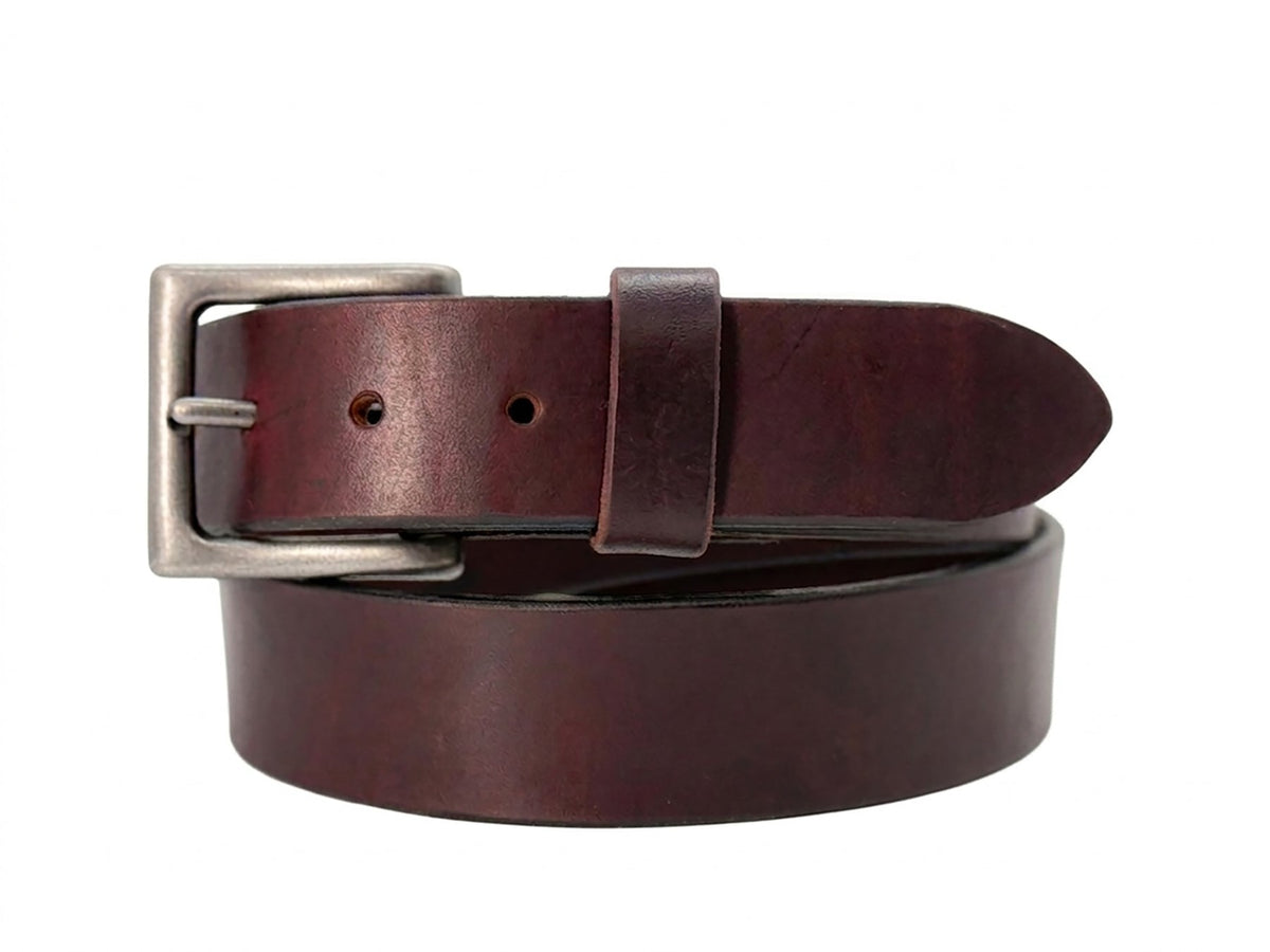 Dark burgundy full-grain latigo leather belt with antique nickel pin buckle on a white background