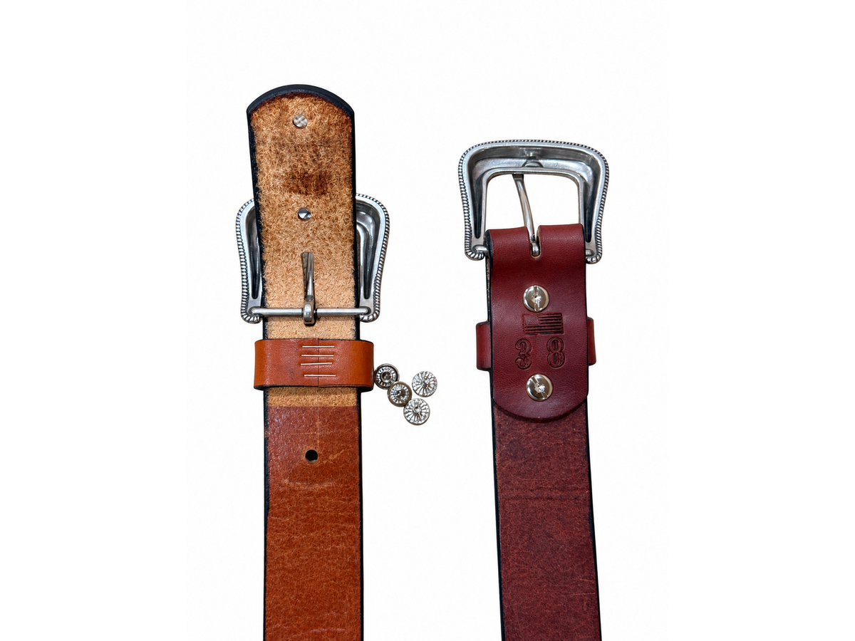 Buckle attachment hardware and leather underside detail of Bourbon and Chestnut bridle leather belts