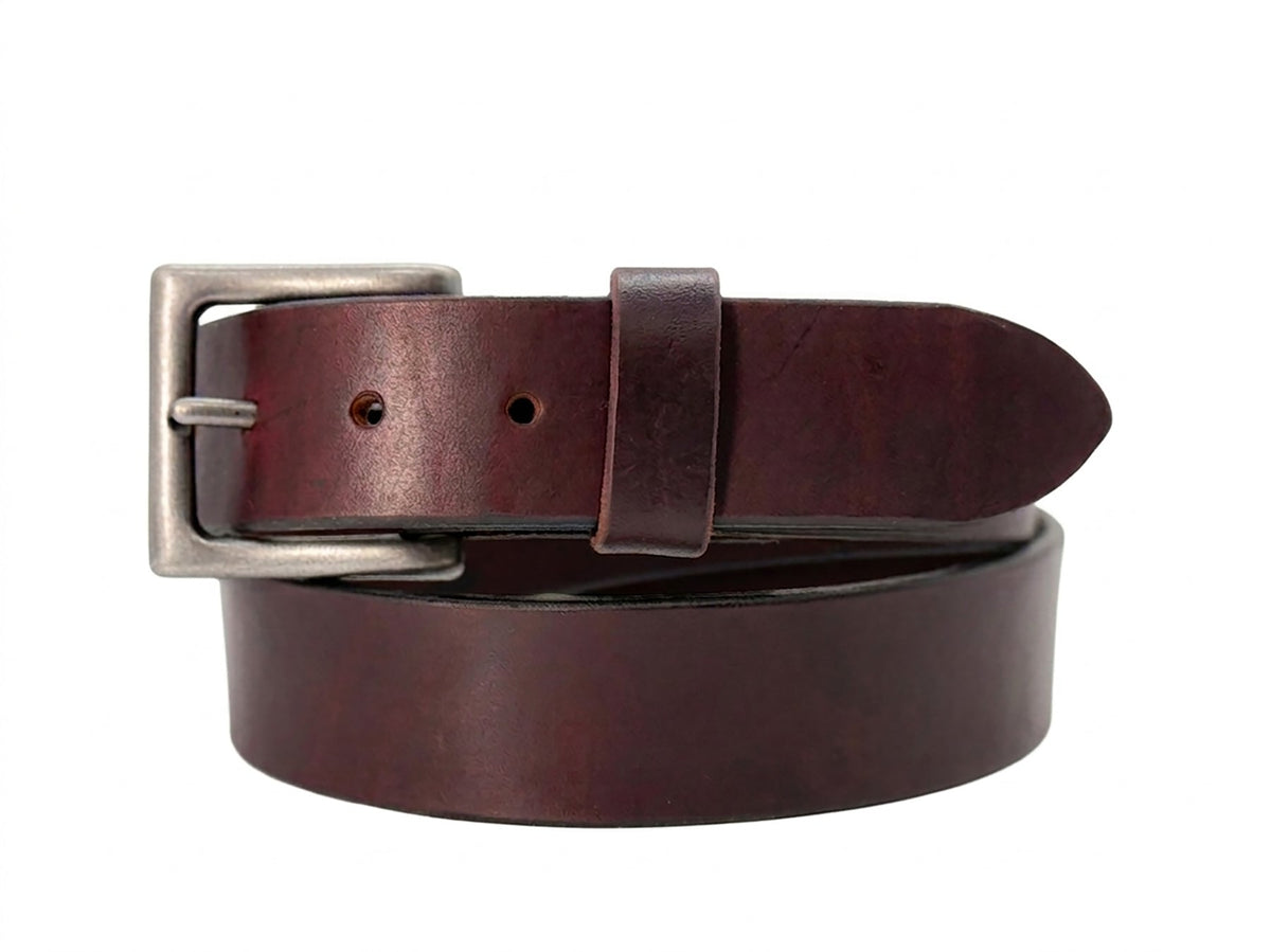 Burgundy leather belt with silver buckle on a white background