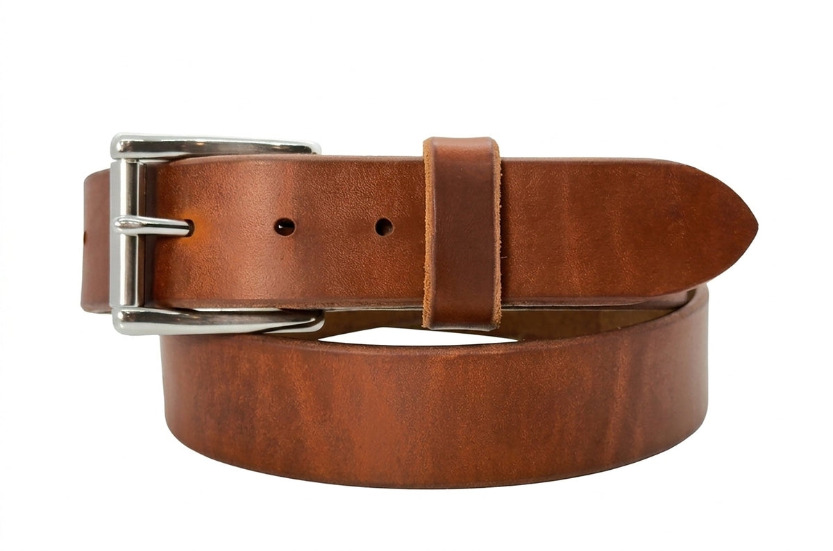 Brown leather belt with a silver buckle on a white background