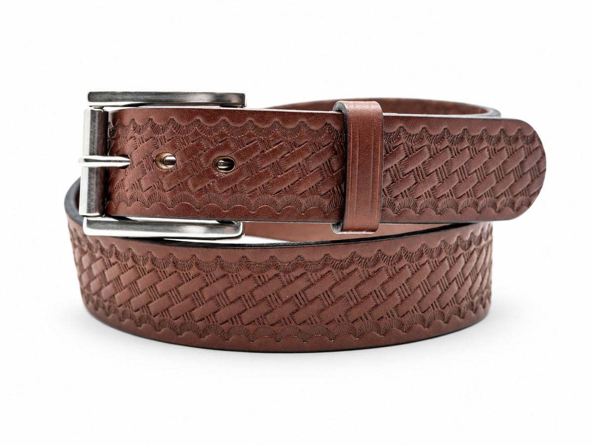 A 1.5" Amish Made Full Grain Leather belt with a basket weave embossed print. The belt has a stainless steel roller buckle and is sitting on a white background.