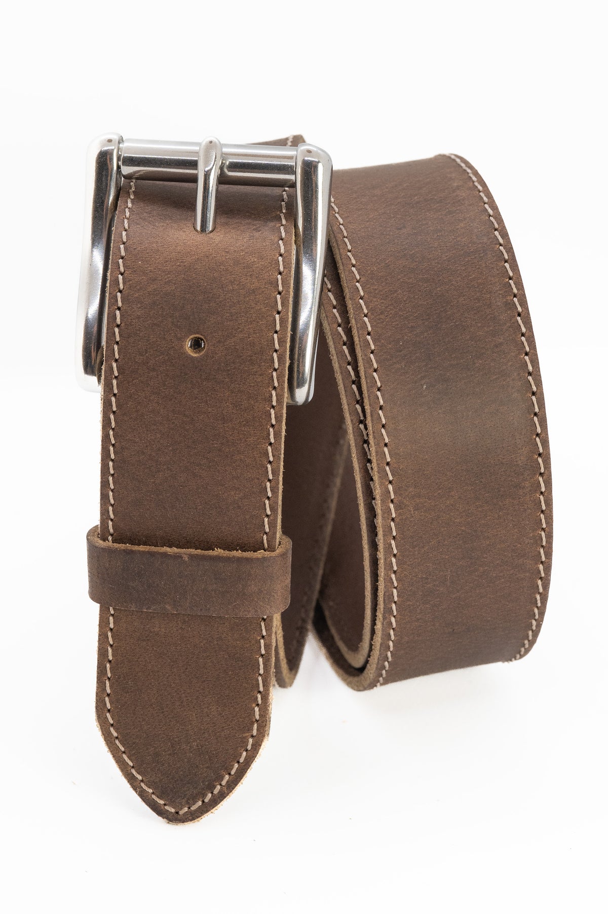 Brown leather belt with silver buckle on a white background