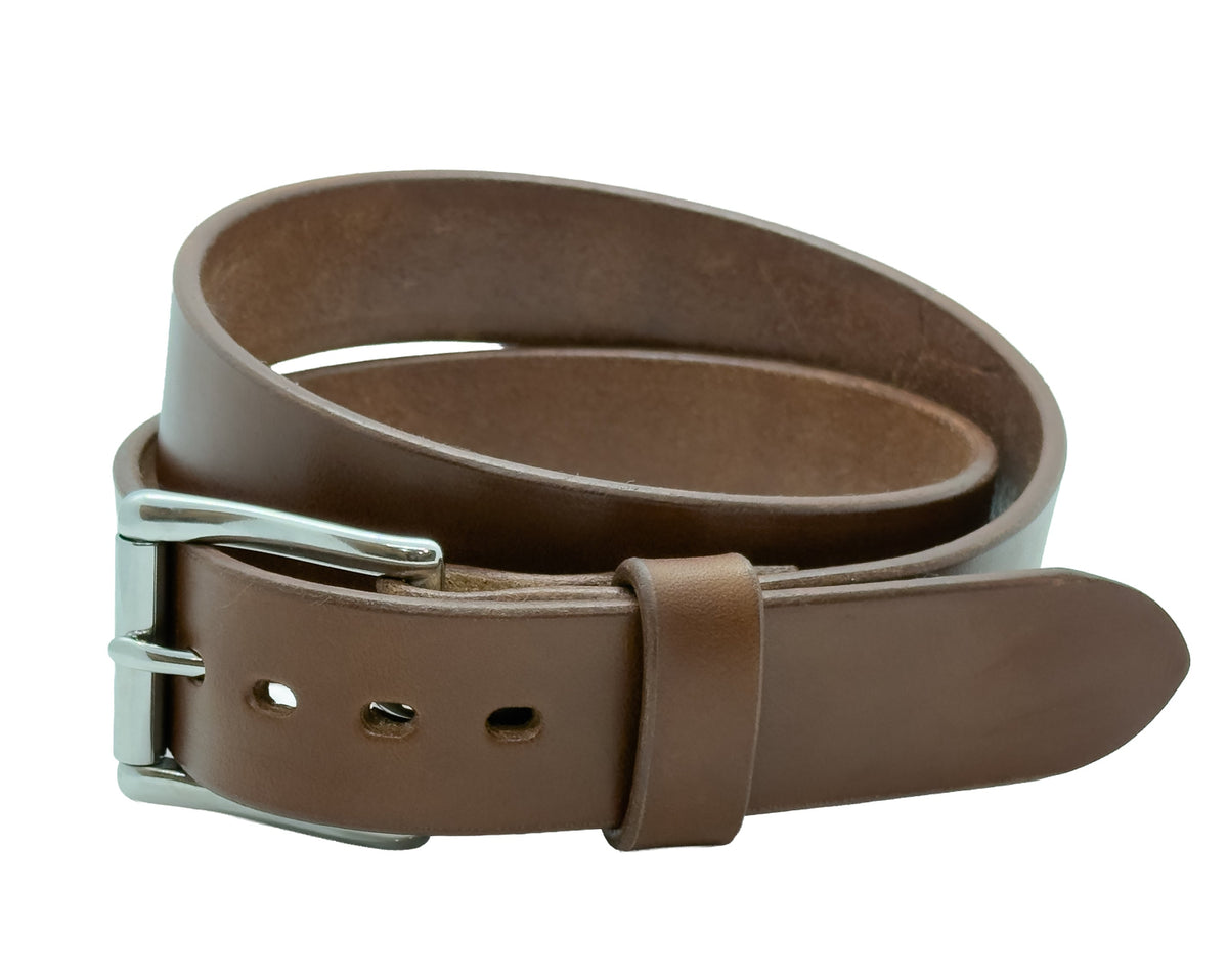 Brown leather belt with silver buckle on a white background