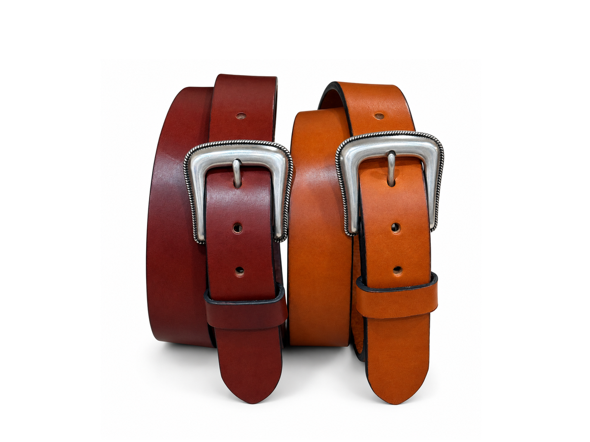 Chestnut and Bourbon bridle leather belts with Roped Edge buckles on a white background
