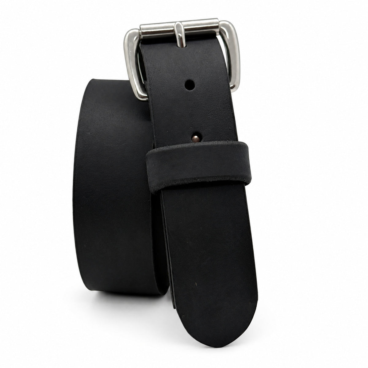 Black Crazy Horse leather belt standing coiled with a Stainless Steel Roller buckle on white.