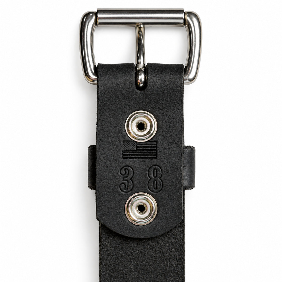 Underside of the black Crazy Horse leather belt showing snap hardware, an American flag, and size 38 on the photographed sample.