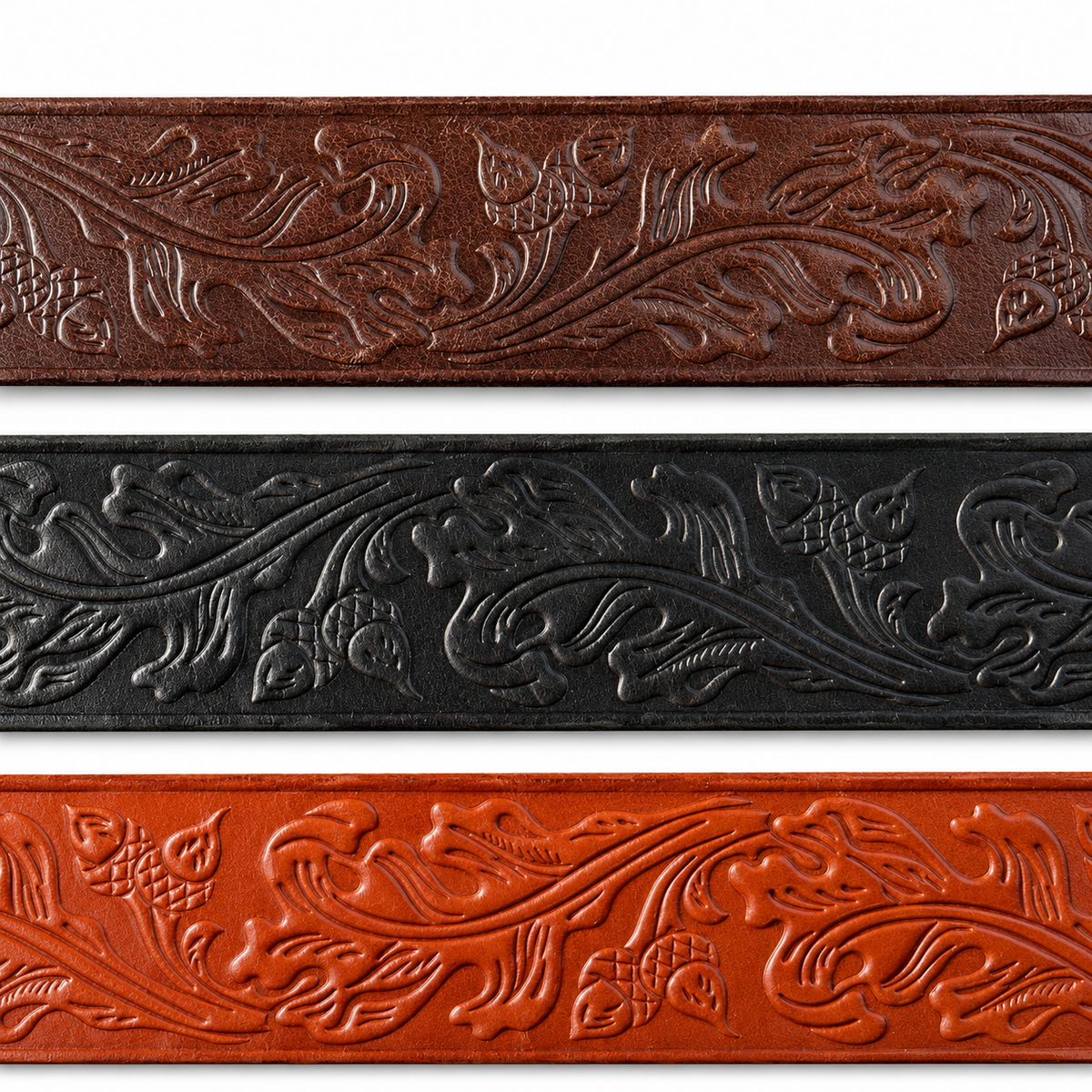 Close-up of the oak leaf and acorn embossed pattern on brown, black, and tan harness leather.