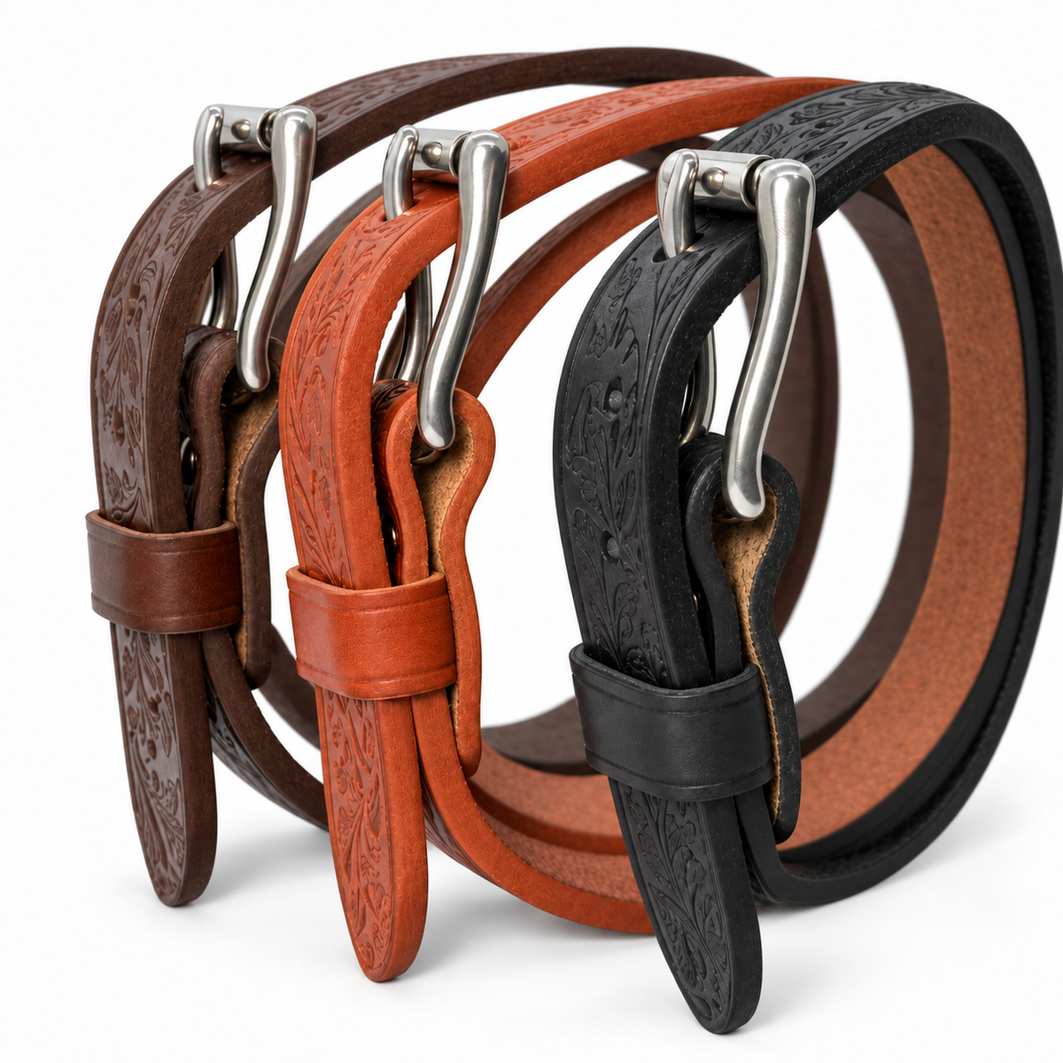 Side view of brown, tan, and black embossed harness leather belts showing thick straps and stainless steel roller buckles.